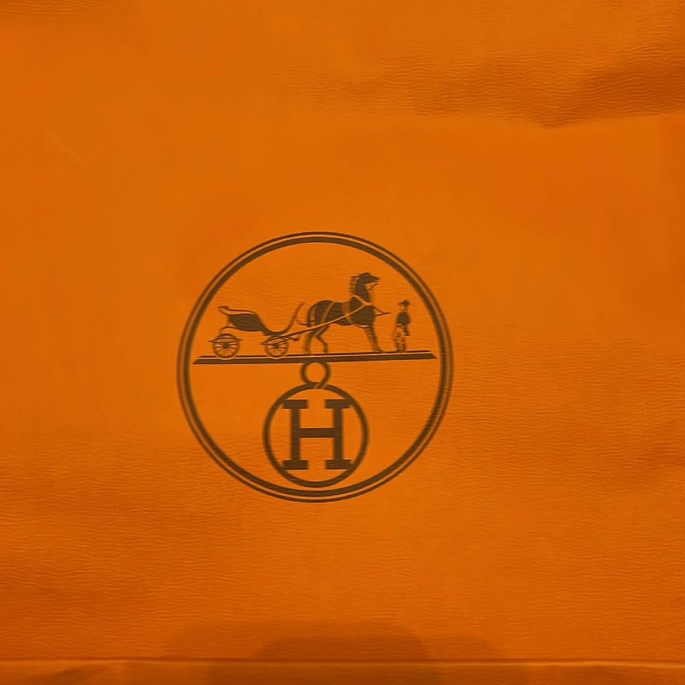 Orange empty Hermes paper bag used